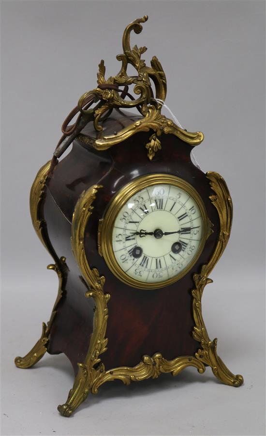 A tortoiseshell and ormolu clock height 34cm